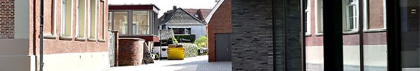 Teilansicht der Fassade vom kult mit umgebender Bebauung